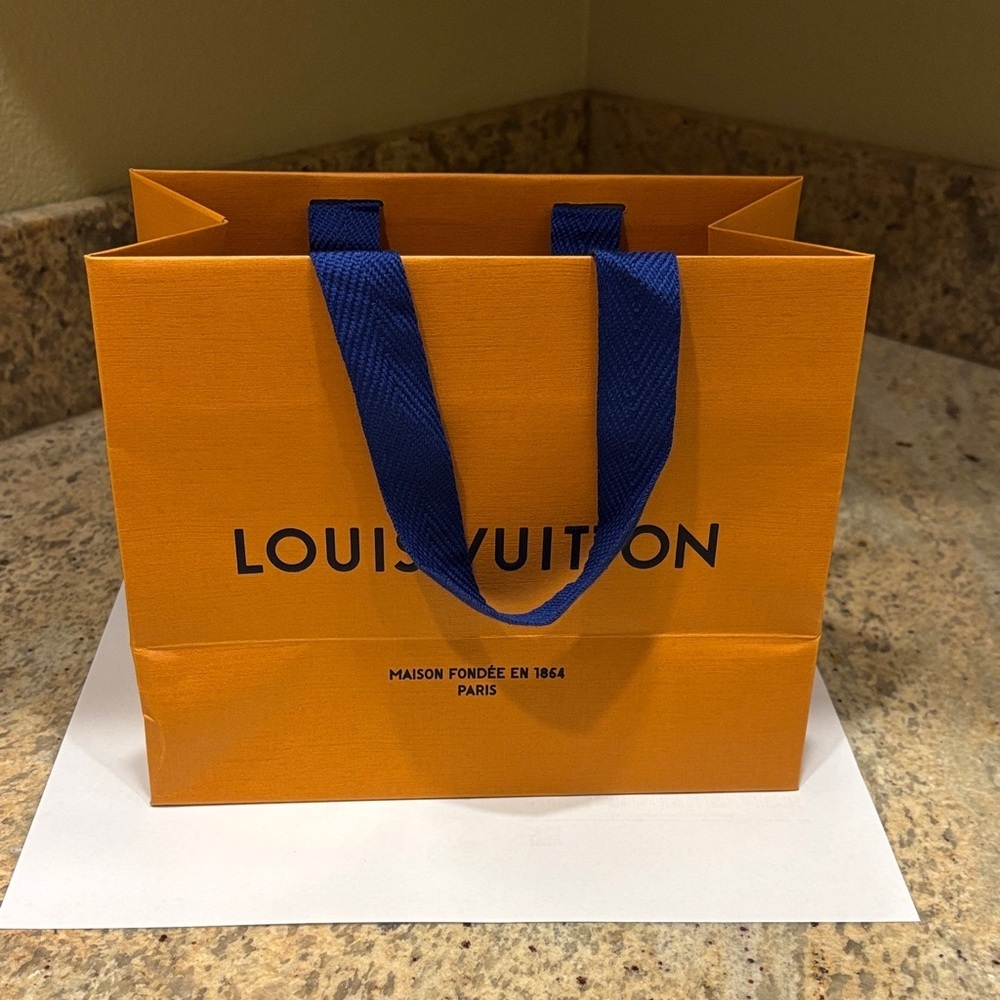Louis Vuitton Bold Orange Bag with Blue Handles